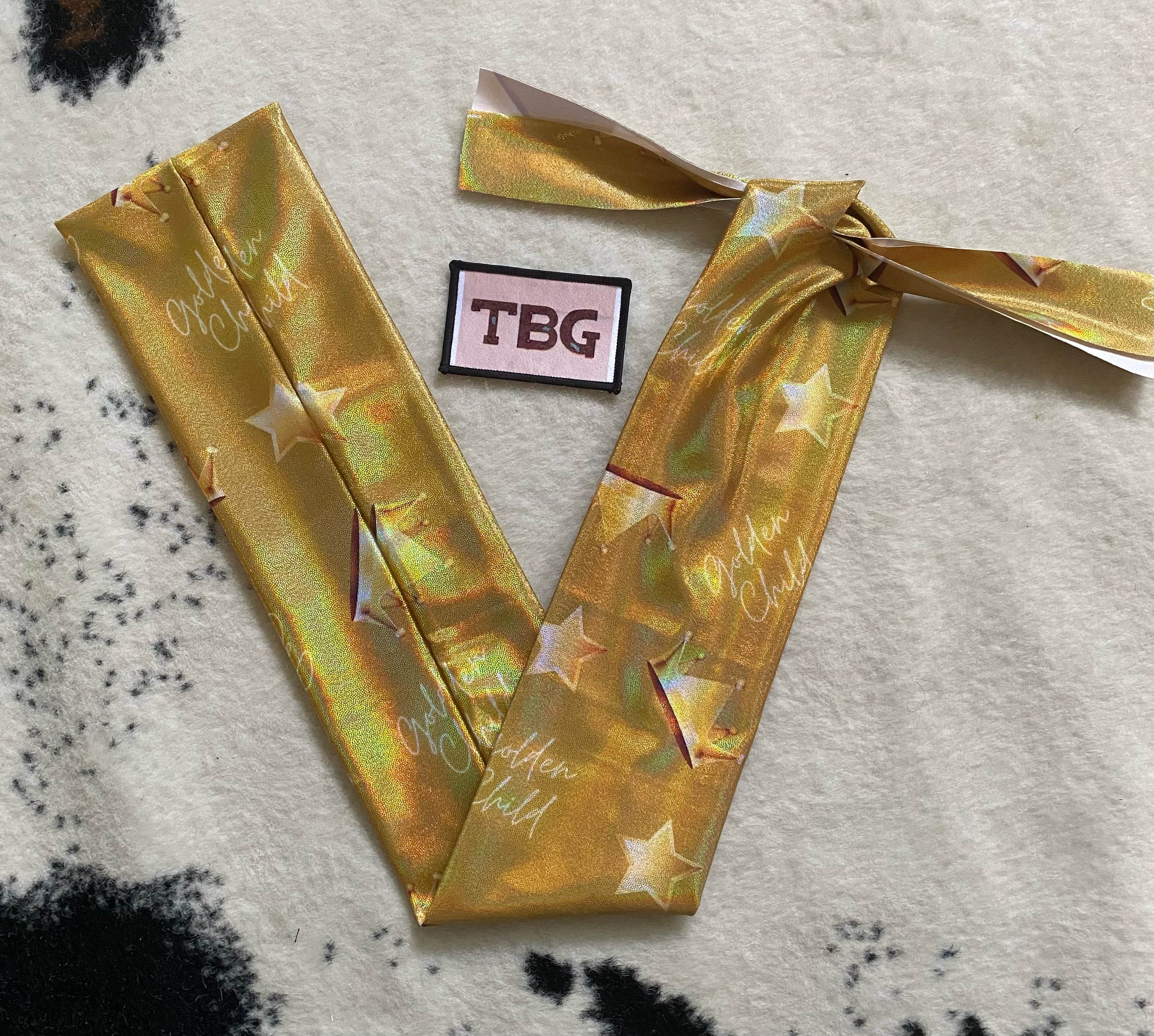 Sparkle Golden Child Tailbag