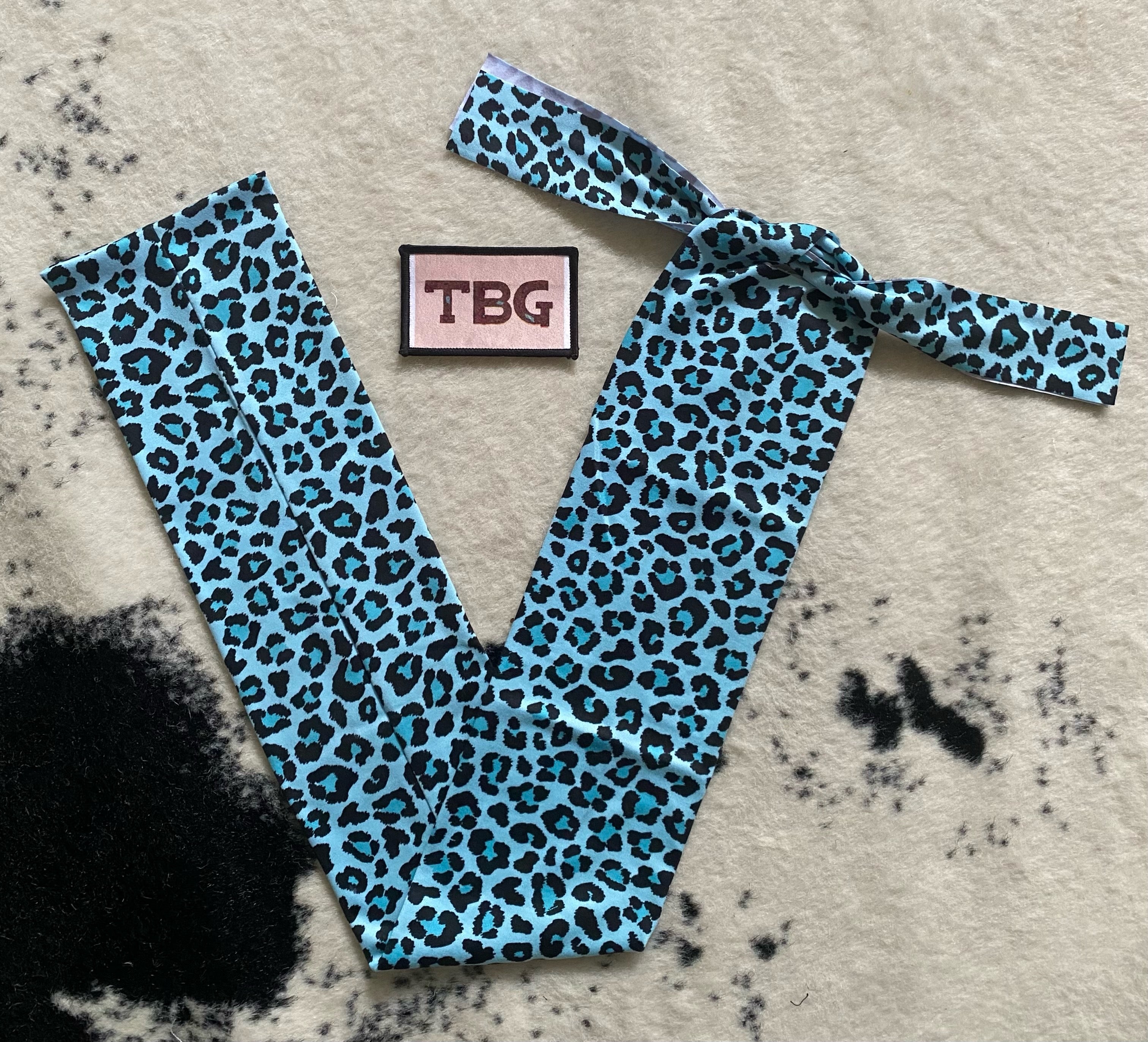 Turquoise Cheetah Tailbag