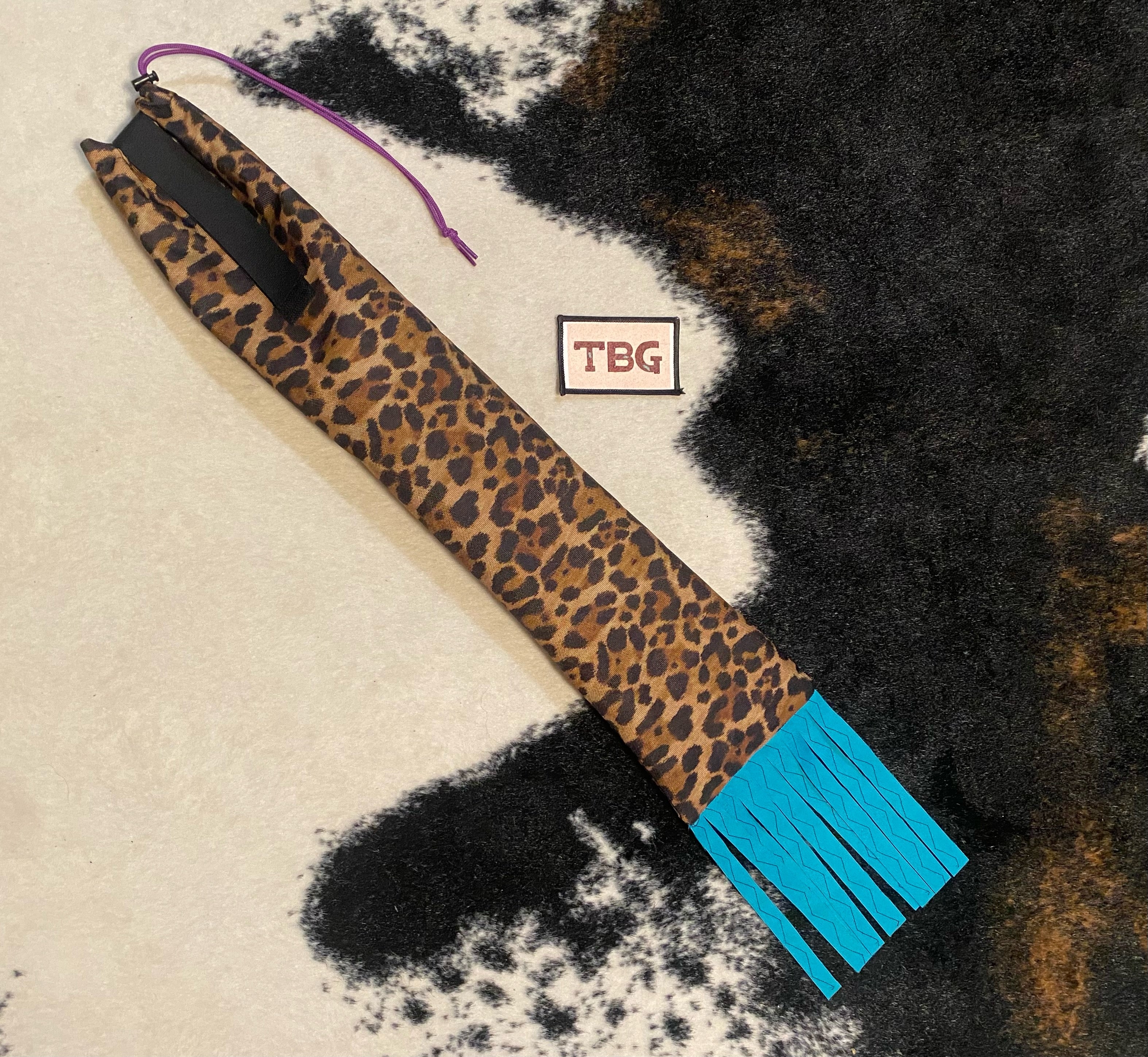 Cheetah Cinched Top Waterproof Tailbag with Turquoise Fringe