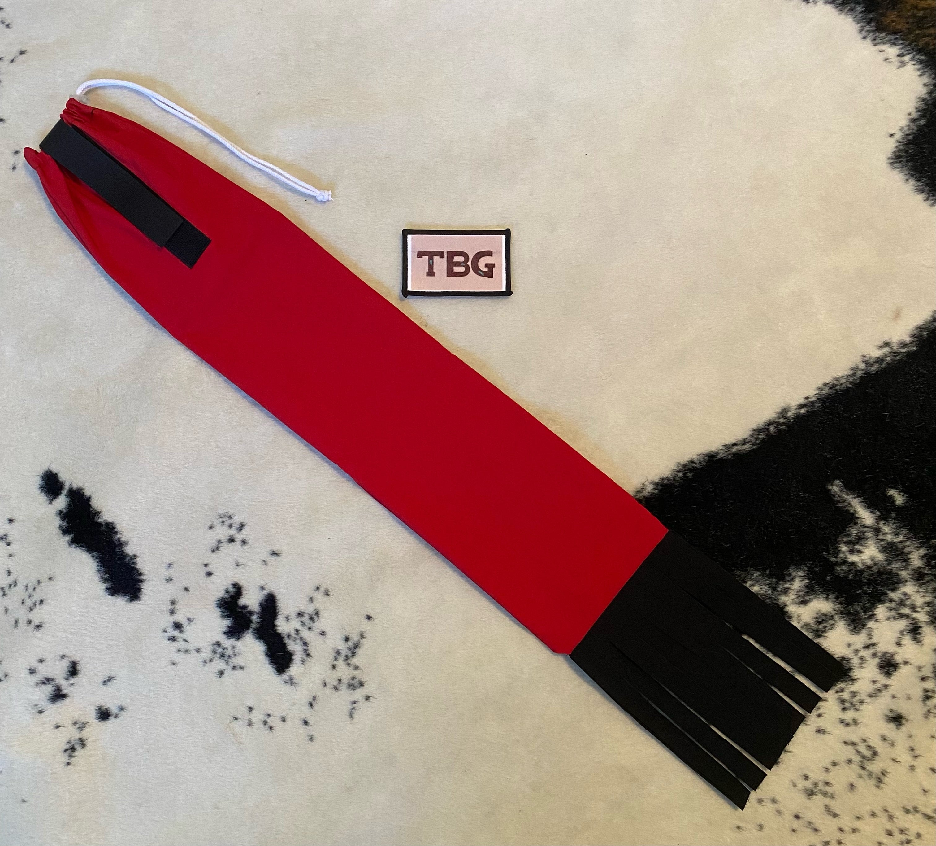 Red Cinched Top Waterproof Tailbag with Black Fringe